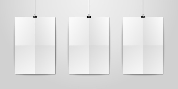 Vector three vector realistic white blank vertical a4 folded paper poster hanging on a rope with binder clip set on white wall mockup empty poster design template for graphics mockup