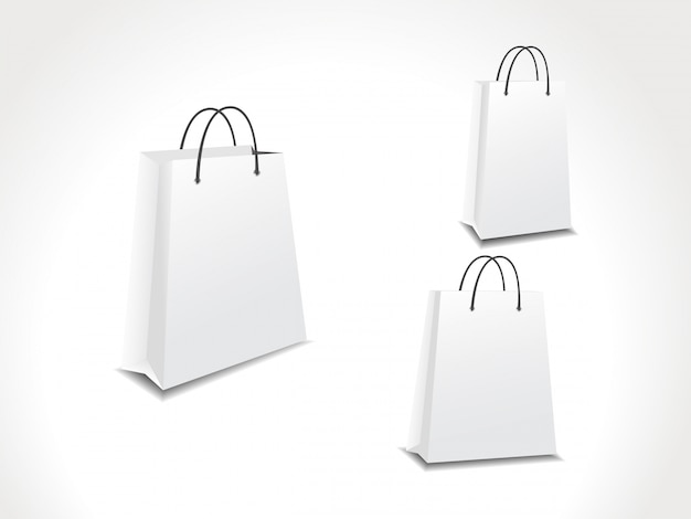 Three white shopping bags