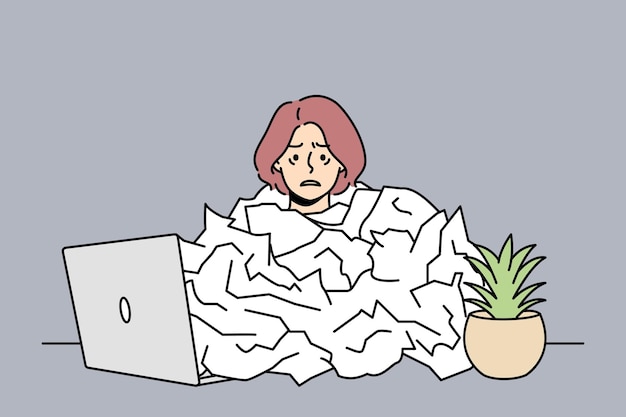 Tired female employee overwhelmed with paper work