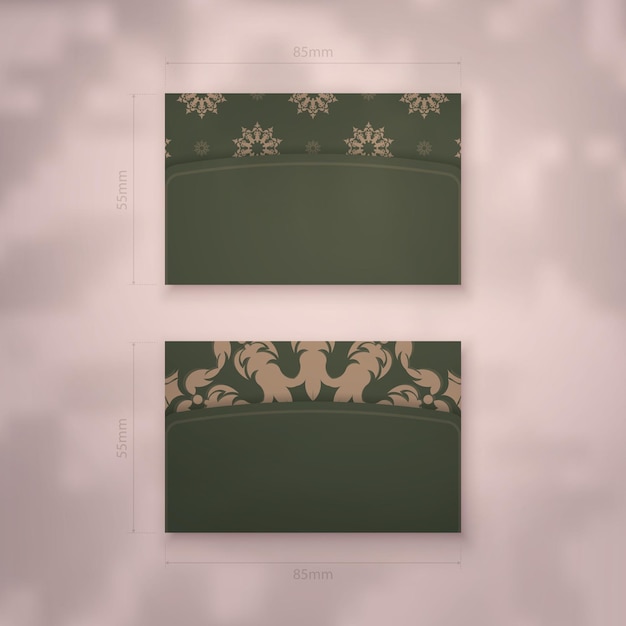 Toonbaar visitekaartje in groene kleur met vintage bruin ornament voor uw zaken.