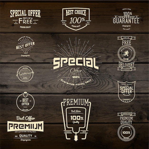 Top quality badges logos and labels. on wooden  texture