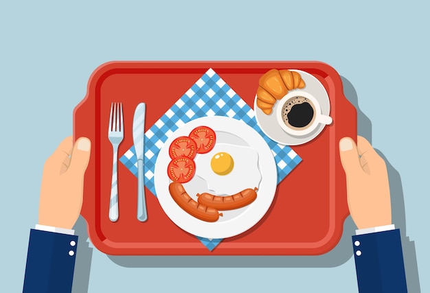 Top view of breakfast on wooden tray