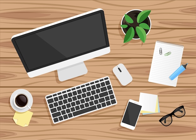 Top view of business workplace on wood desk