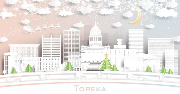 Topeka kansas usa city skyline in paper cut style with snowflakes moon and neon garland