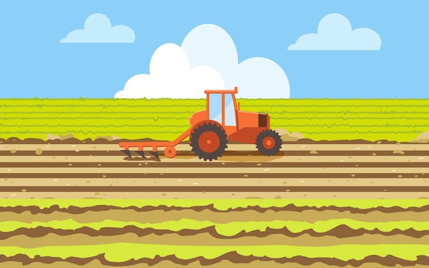 Tractor with a plow in the agricultural field