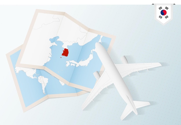 韓国への旅行、韓国の地図と旗のある平面図の飛行機。