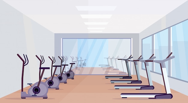 Treadmills and stationary bicycles modern equipment sport activities healthy lifestyle concept empty no people gym interior design horizontal