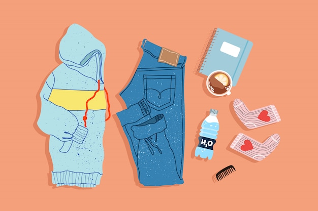 Trendy sport outfit top-down view. hand-drawn instagram style lay illustration. modern hoodie, jeans, socks and note book on a plain background. objects are .