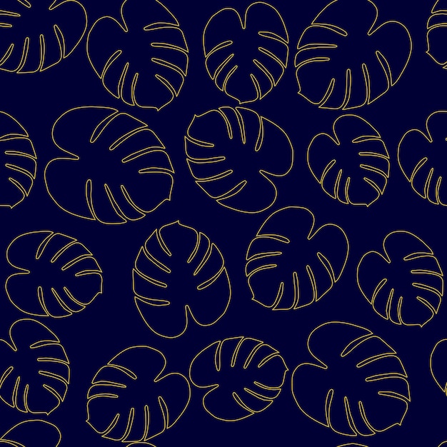 Tropical leaves on dark blue