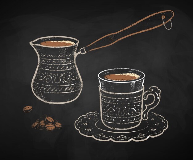 Turkish coffee cup and cezve on black chalkboard background