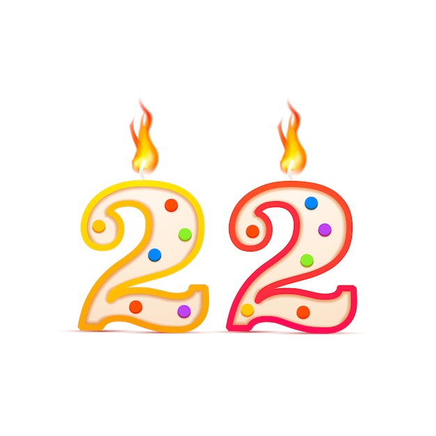 Twenty two years anniversary, 22 number shaped birthday candle with fire isolated on white