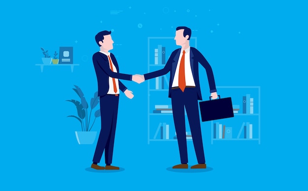 Two businessmen shaking hands in office doing a deal and coming to an agreement