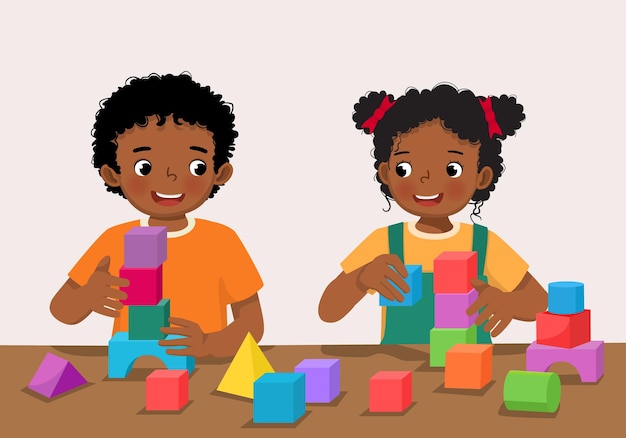 two children playing with blocks on a table and one has a yellow shirt on