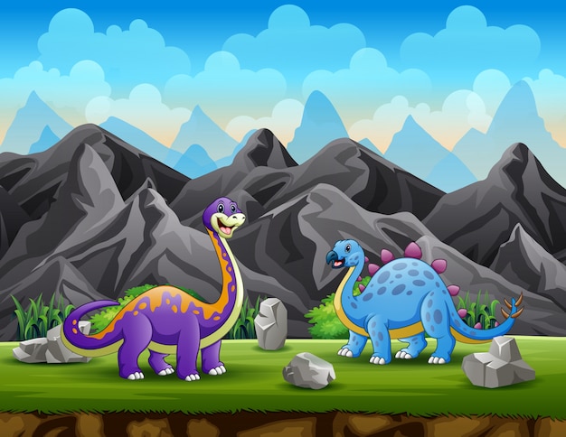 Two dinosaurs at the mountain cliff background