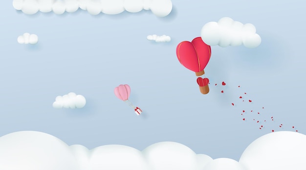 Two heart-shaped balloons fly in the clouds for Valentine's Day