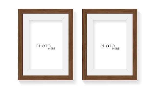 Two realistic photo frame mock up on isolated white wall design 2 photo frames mock up vector