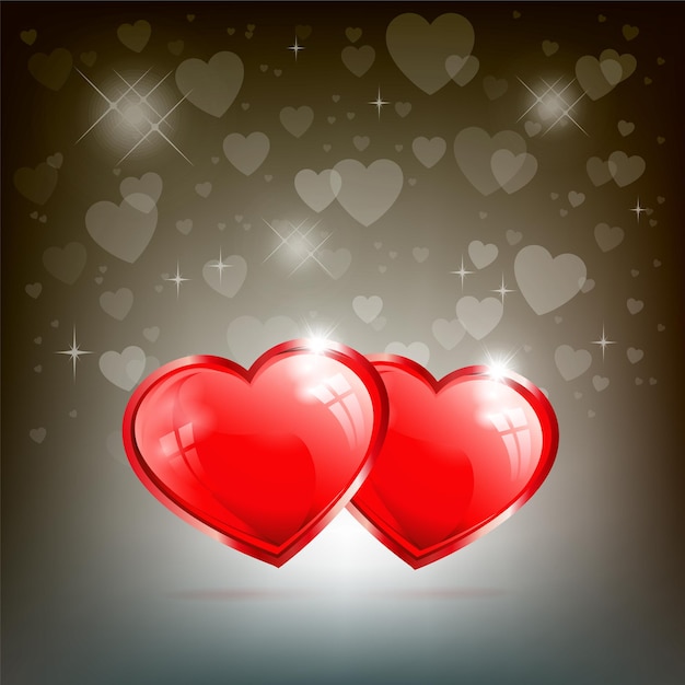 Two red hearts on a dark background with glitter