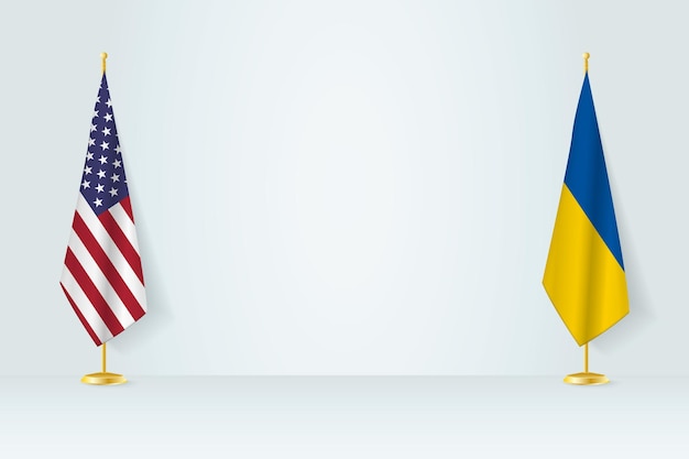 United States and Ukraine flag on indoor flagpole meeting concept between Ukraine and United States