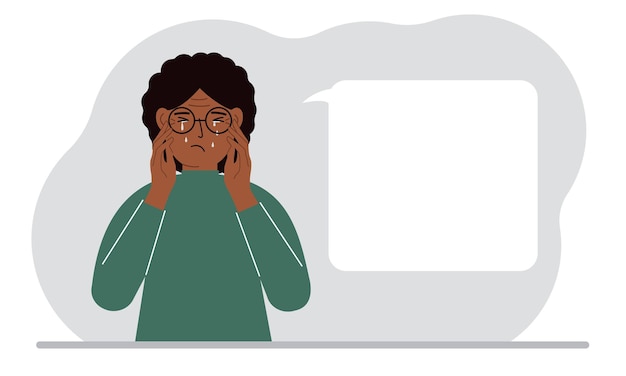 Upset woman cries and holds his head with his hands The concept of resentment pain and depression