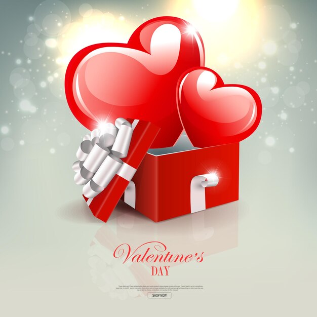 Valentijnsdag lichte compositie met twee rode harten met glitters in de doos