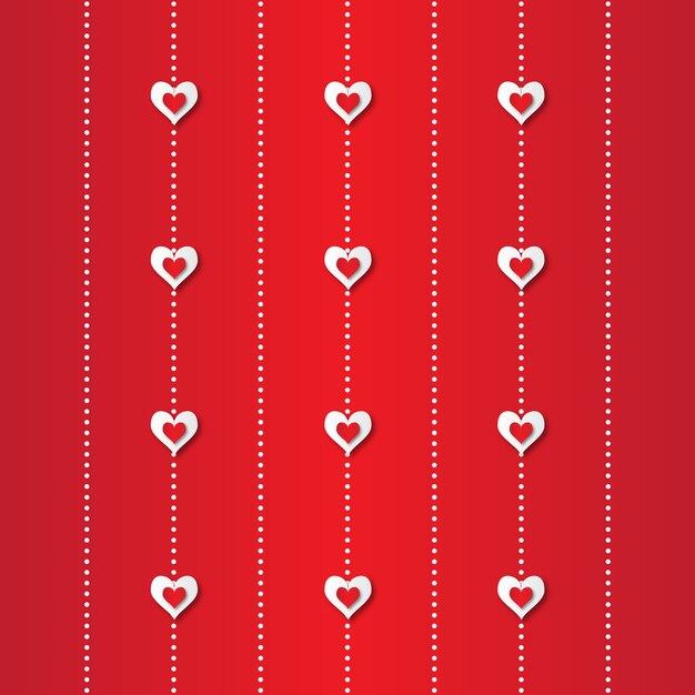 バレンタインデーの抽象的なアップリケとカットの赤と白の紙のハート。