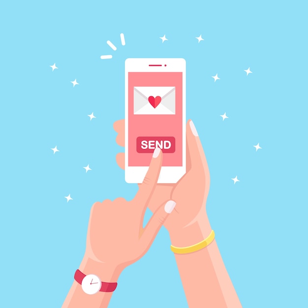 Valentine's day . Send or receive love sms, letter, email with white mobile phone. Human hand hold cellphone, smartphone  on background. Envelope with red heart.   