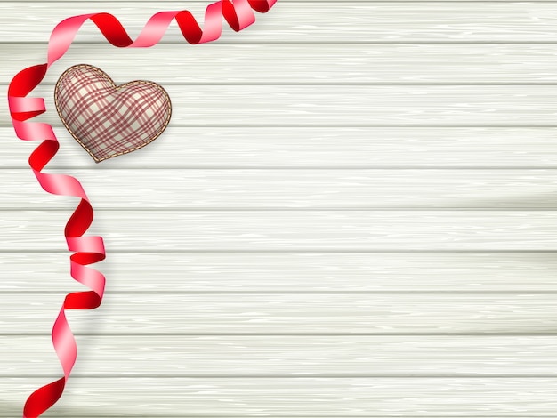 Vector valentines day toy heart and ribbon over wooden table background with copy space.