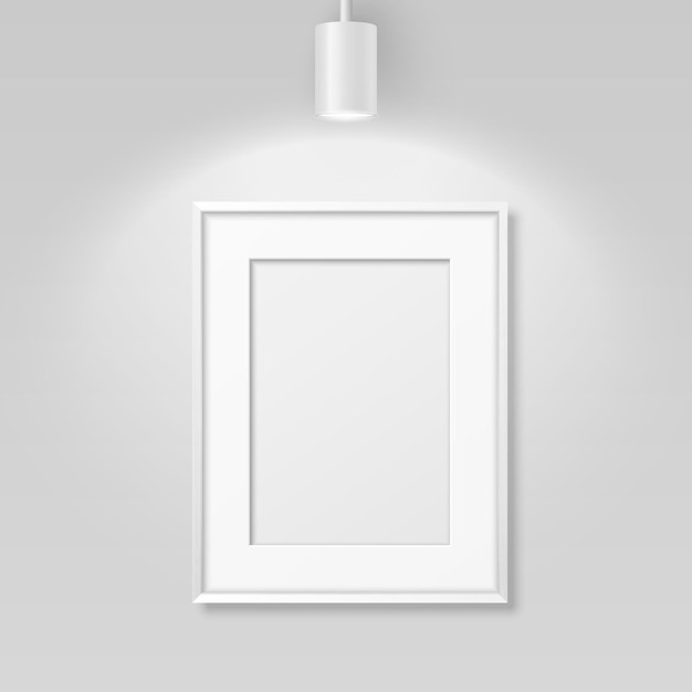Vector 3d Realistic A4 White Wooden Simple Modern Frame for Presentstion on a White Wall Background with a Luminous Spot Lamp on Top Above Frame Design Template for Mockup Front View