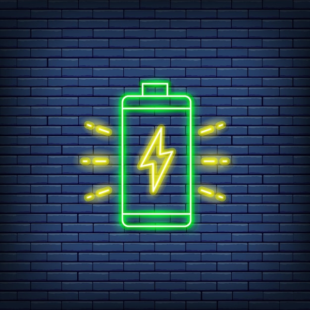 Vector battery accumulator charging neon sign Isolated on a brick wall background