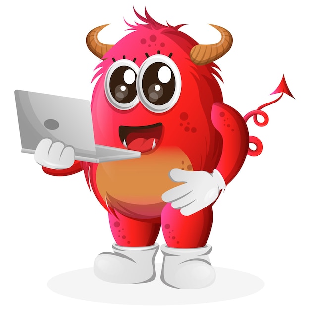 Vector Cute red monster working using a laptop