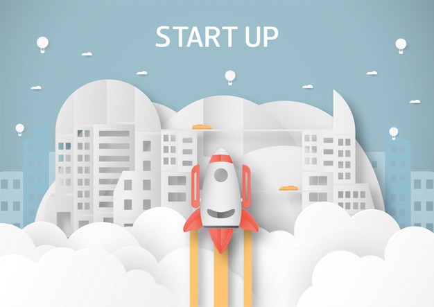 Vector illustration with start up concept in paper cut, craft and origami style. rocket on the sky.