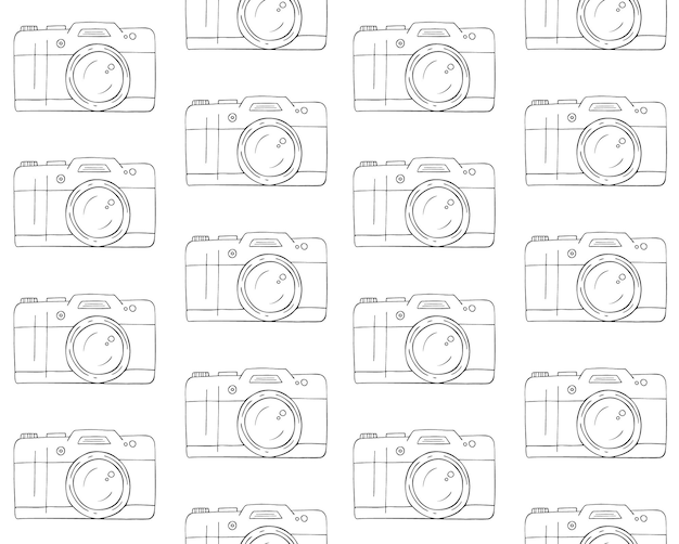 Vector seamless pattern of hand drawn photo camera