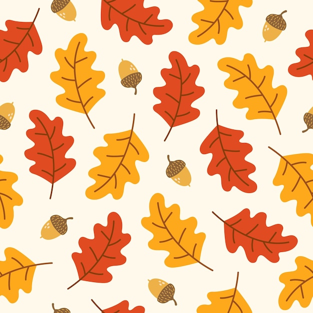 Vector seamless pattern with acorns and autumn oak leaves in red and yellow