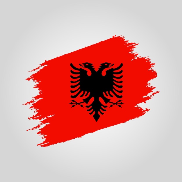 Vector vlag van Albanië Penseelstreek met grunge achtergrond sjabloon