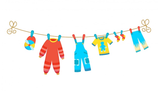 Verschillende items van baby kleding op touw geïsoleerd. wasgoed wordt vastgehouden door het drogen van plastic pinnen.