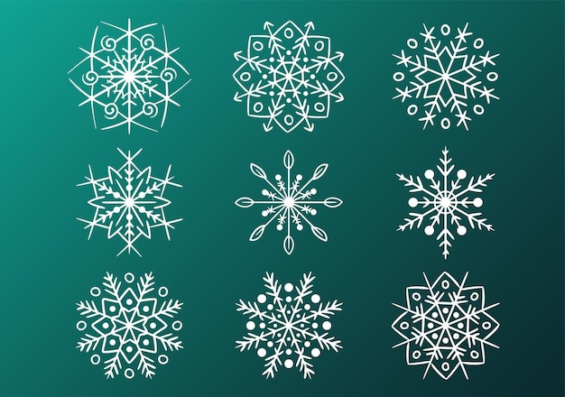 Verzameling van vector verschillende getekende witte decoratieve sneeuwvlokken op een groene achtergrond