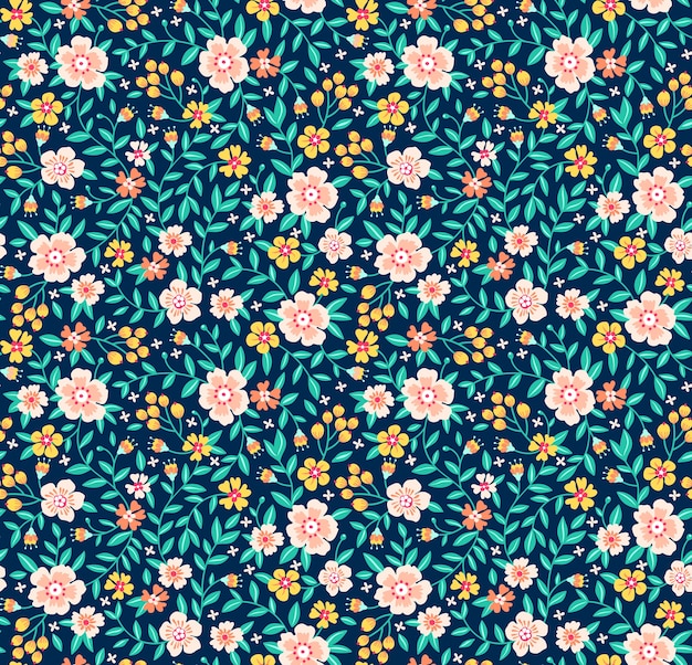 Vintage bloemen achtergrond. Naadloos patroon voor design en modeprints. Bloemenpatroon met kleine gele bloemen op een donkerblauwe achtergrond. Ditsy-stijl.