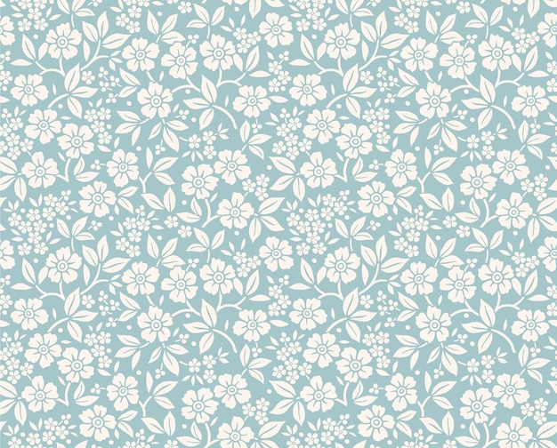 Vector vintage floral pattern in small white flowers seamless printfor fashion print blue background