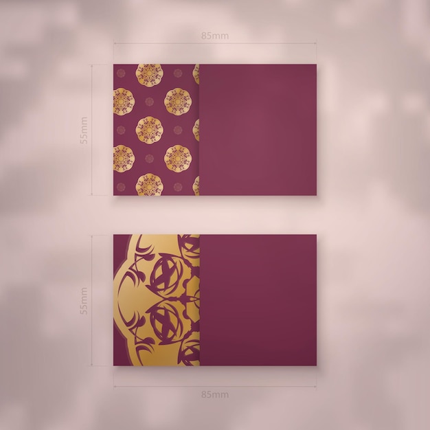 Vintage gold pattern burgundy business card for your business.