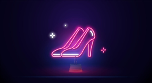 Vintage lichtgevende bord met roze schoenen met hoge hakken op een