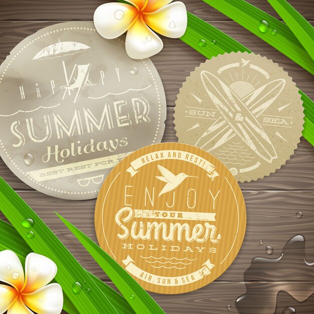 Vintage paper labels with vacation and travel emblems and tropical flowers on a wooden surface -   illustration.