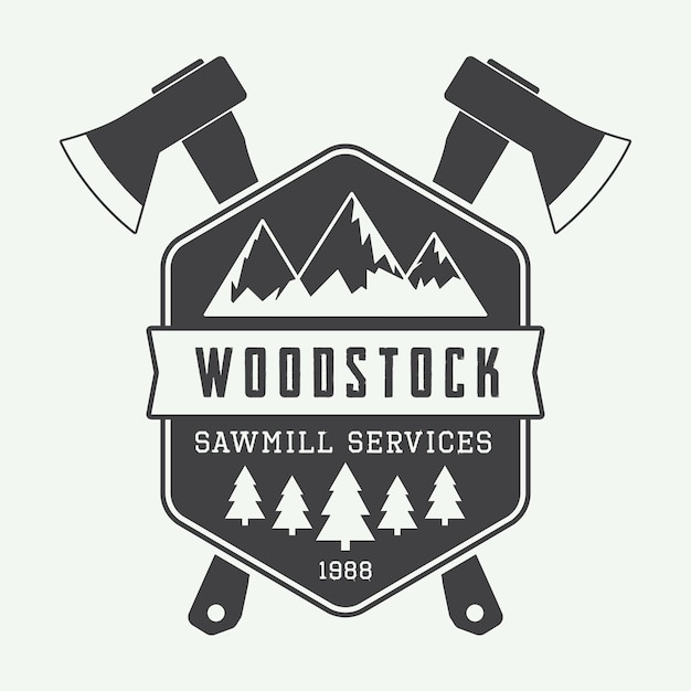 Vintage sawmill logo with axes, rocks, trees