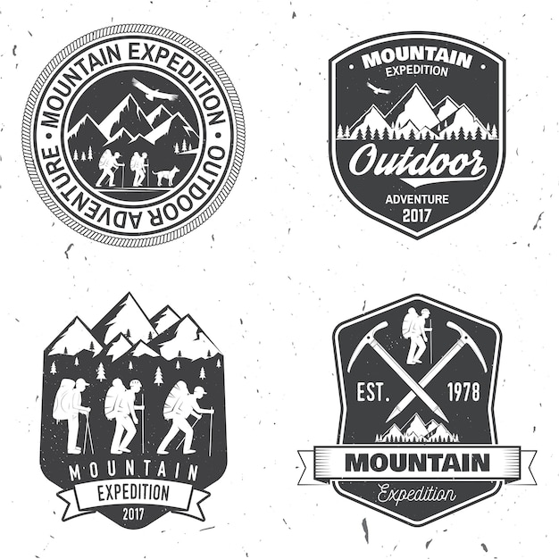Vector vintage typography design with mountaineers and mountain silhouette