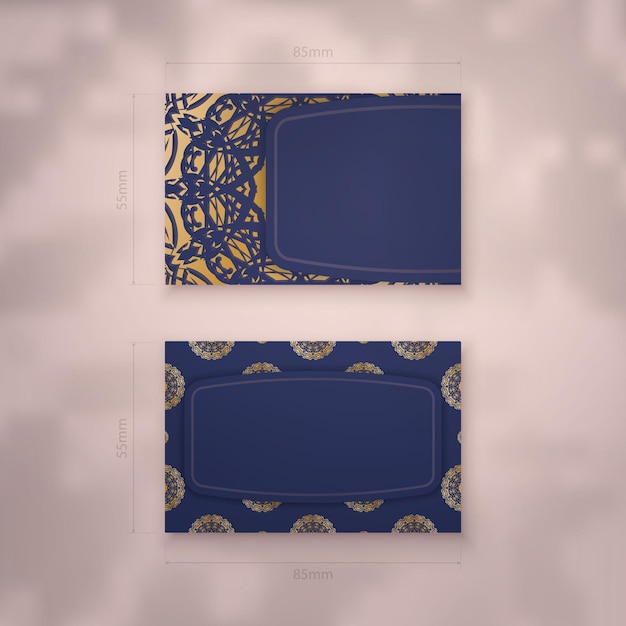 Visitekaartje in donkerblauw met abstract gouden ornament voor uw contacten.