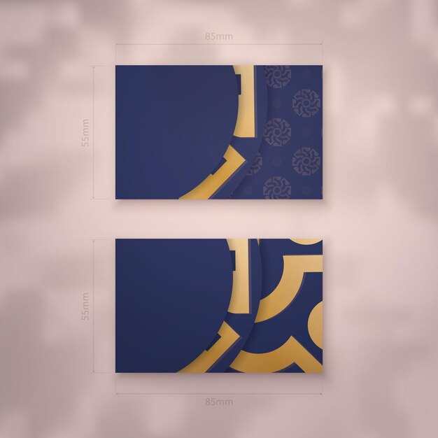 Vector visiting business card in dark blue with vintage gold pattern for your contacts.