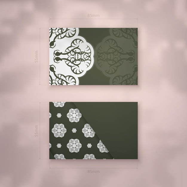 Visiting business card in dark green color with abstract white ornament for your contacts.