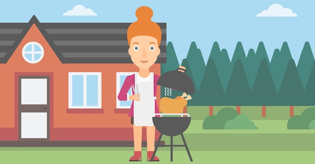 Vrouw die barbecue voorbereidt.