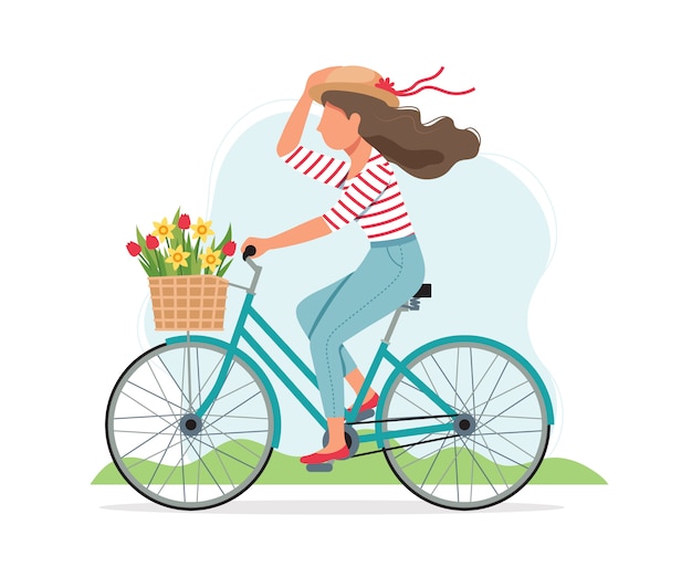 Vrouw die een fiets in de lente met bloemen in de mand berijden.