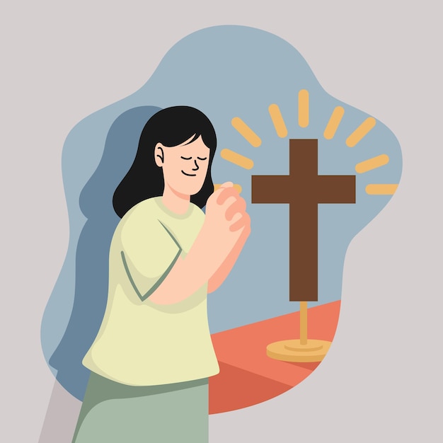 Vrouw die voor een kruis bidt