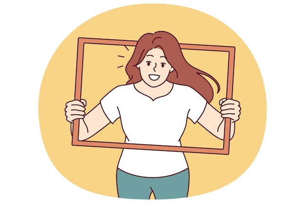 Vrouw kijkt uit het fotoram en wil een creatieve opname maken voor fotoalbum positief meisje in